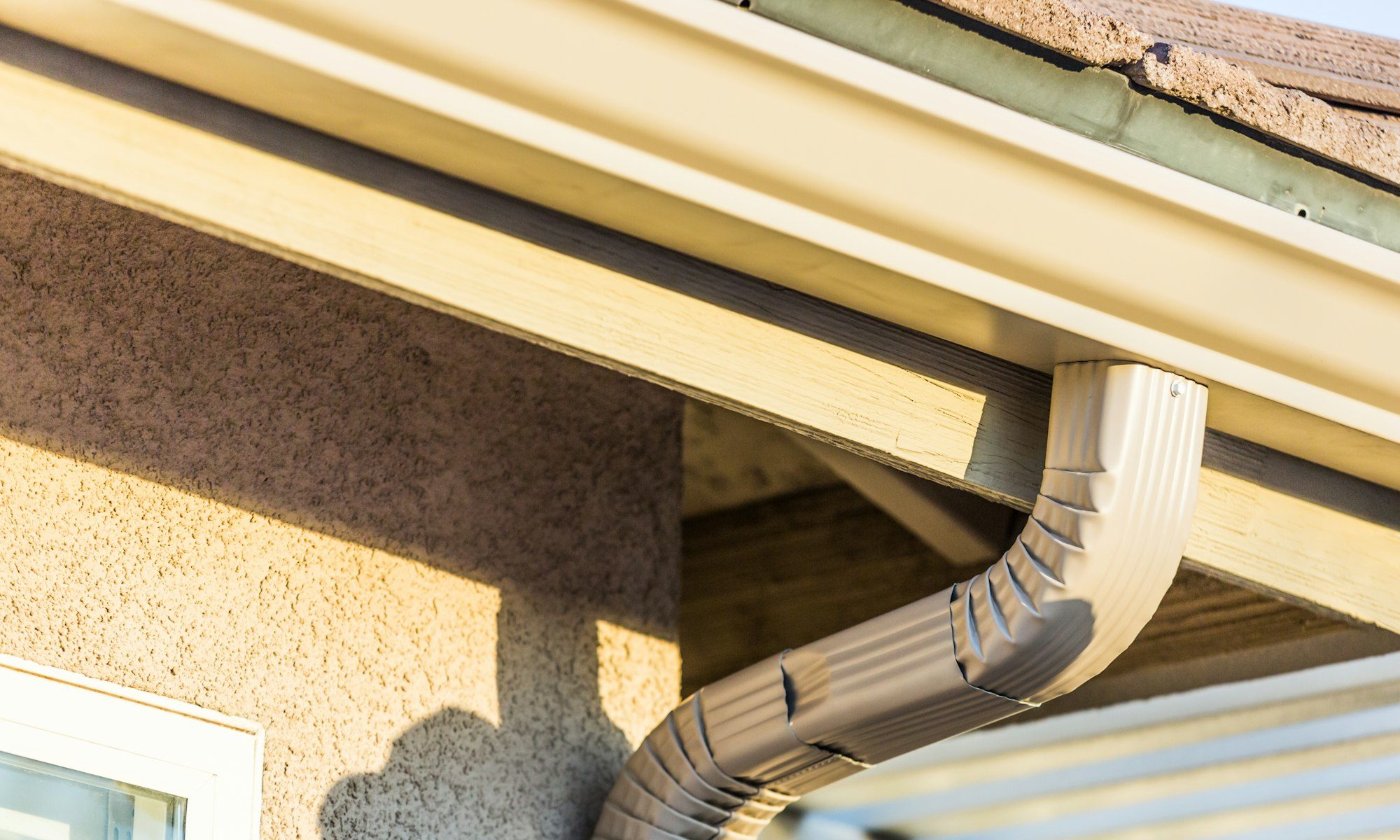 House with New Seamless Aluminum Rain Gutters
