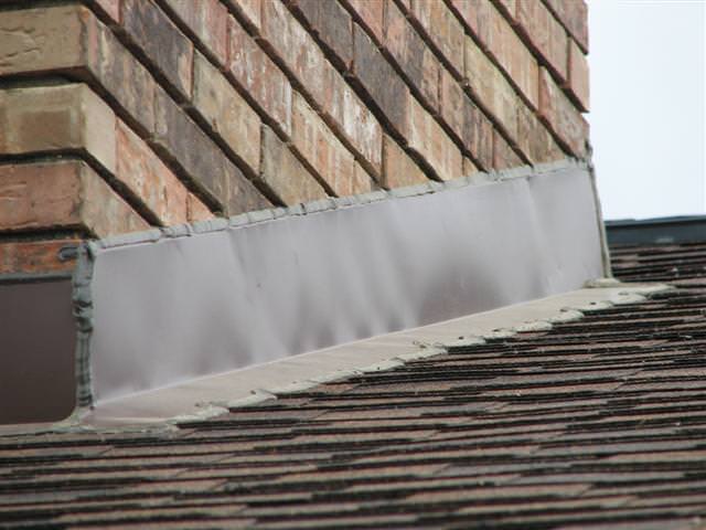 counter metal flashing on roof chimney