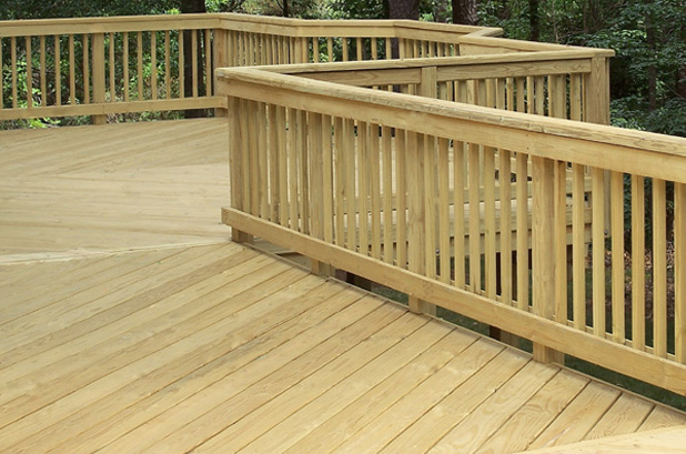 pressure treated wood deck and railing on michigan home