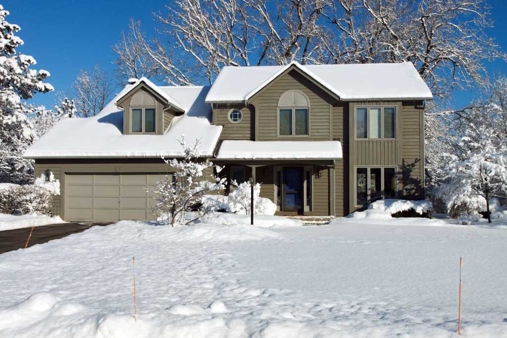 Snow, Ice, and Your Roof: What You Need to Know This Winter